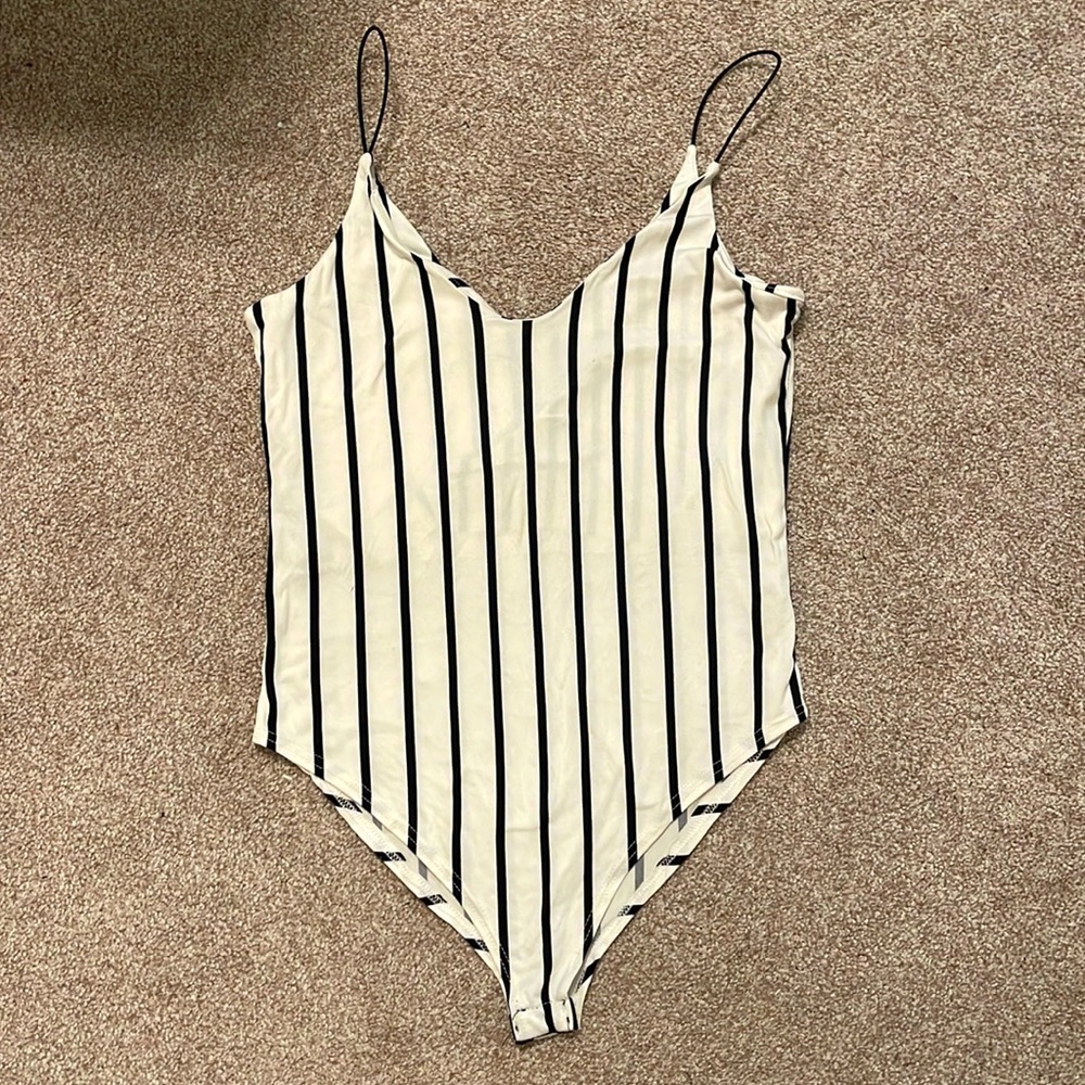 Black and white striped body suit